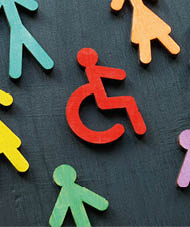 Colorful figurines on the dark surface. Diversity and inclusion concept.