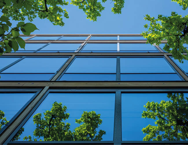 Carbon-Neutral Building: A building that offsets all carbon emissions generated by its construction and operation, often through renewable energy and carbon credits, close-up --chaos 15 --ar 16:9 --stylize 150 --v 6 Job ID: eca25cc8-a0c9-4a31-98d8-924abb26a1c5