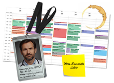 un badge nominatif déposé à côté d'un agenda - MACSF