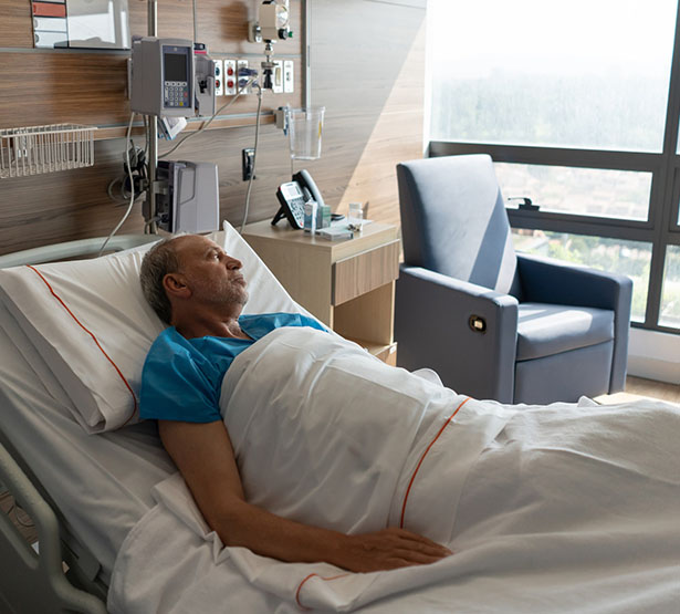Un patient dans son lit d'hopital | MACSF